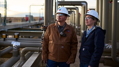 Workers converse at a tankless facility in Greeley, Colorado.