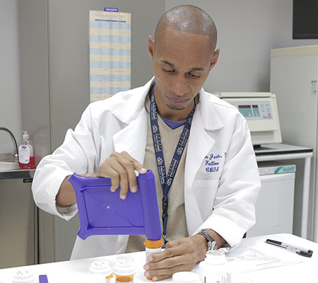 A pharmacist filling a prescription